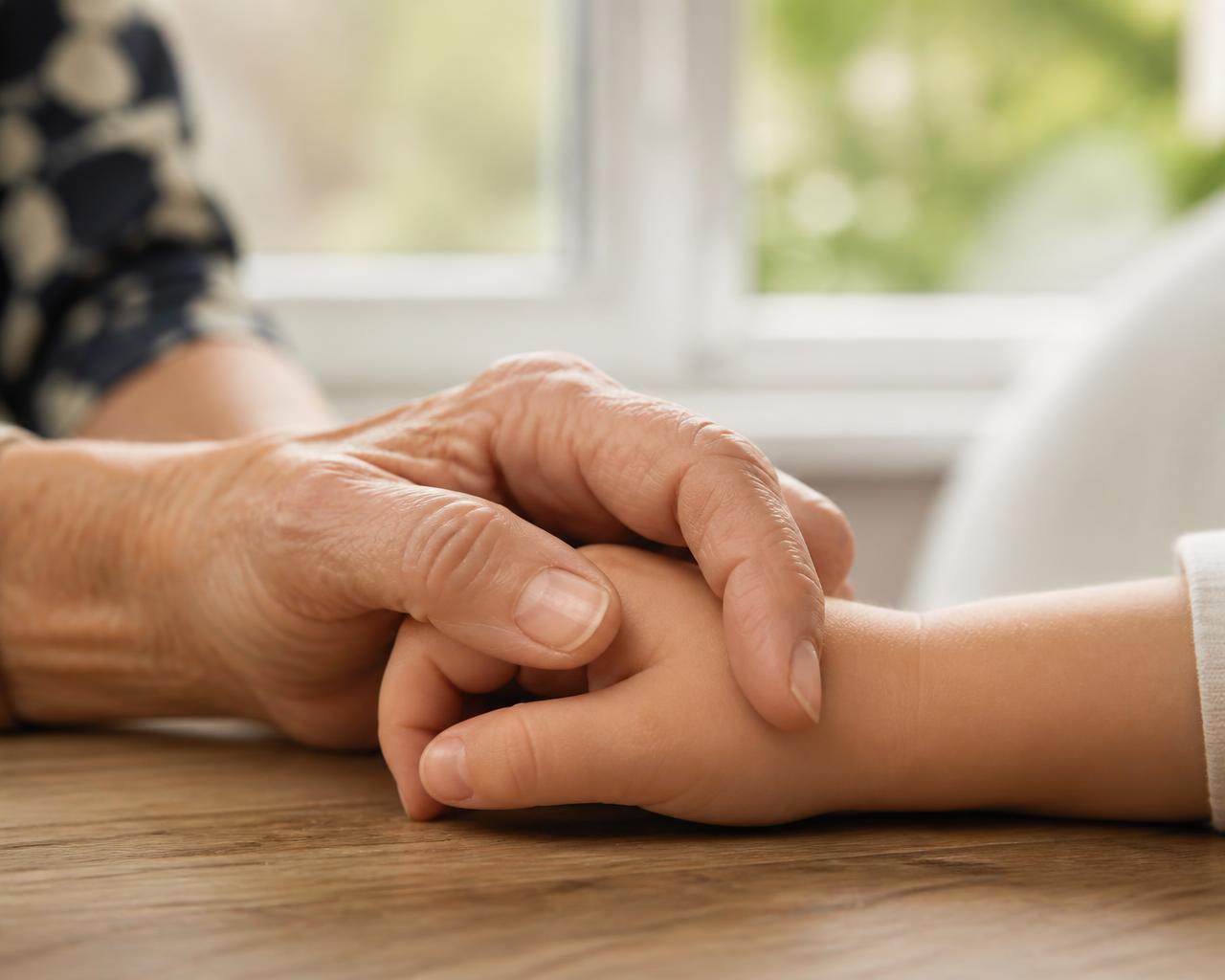 Generations holding hands